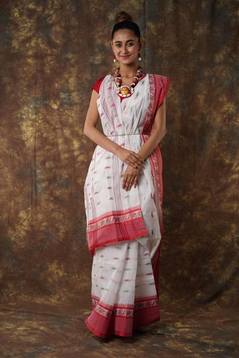 Traditional red & white colour combination Pure Cotton Bengali Handloom Tant Saree Without Blouse Piece 𝐒𝐢𝐳𝐞: Length: 5.5 Meters Width: 1.2 Meters Showcasing the Rich Cultural Heritage of Bengal.DN NO-1060