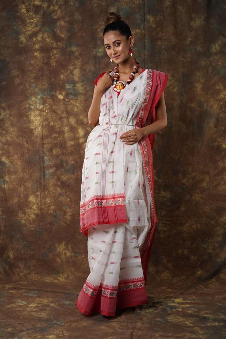 Traditional red & white colour combination Pure Cotton Bengali Handloom Tant Saree Without Blouse Piece 𝐒𝐢𝐳𝐞: Length: 5.5 Meters Width: 1.2 Meters Showcasing the Rich Cultural Heritage of Bengal.DN NO-1060