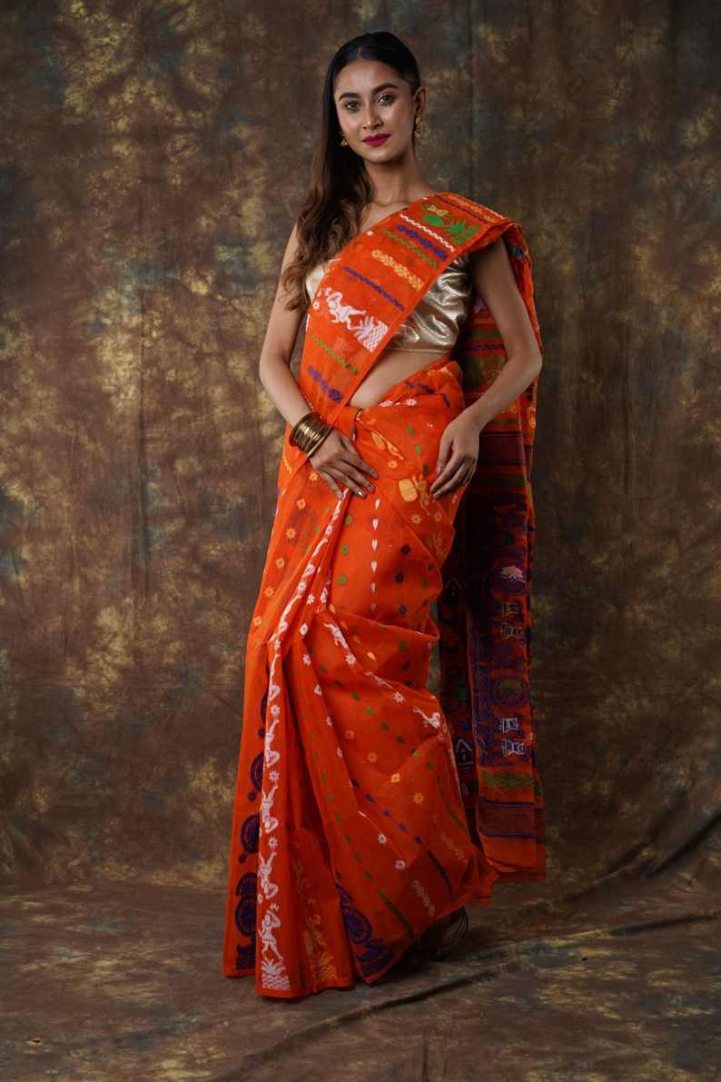 Traditional Bengal Cotton Silk Soft Jamdani Saree with orang colour combination ,Handwoven in the Rich Heritage of Bengal Minakari Dhakai | Item Length: 5.5 Metres Width: 1.2 Meters | Without Blouse Piece.DN NO-1059