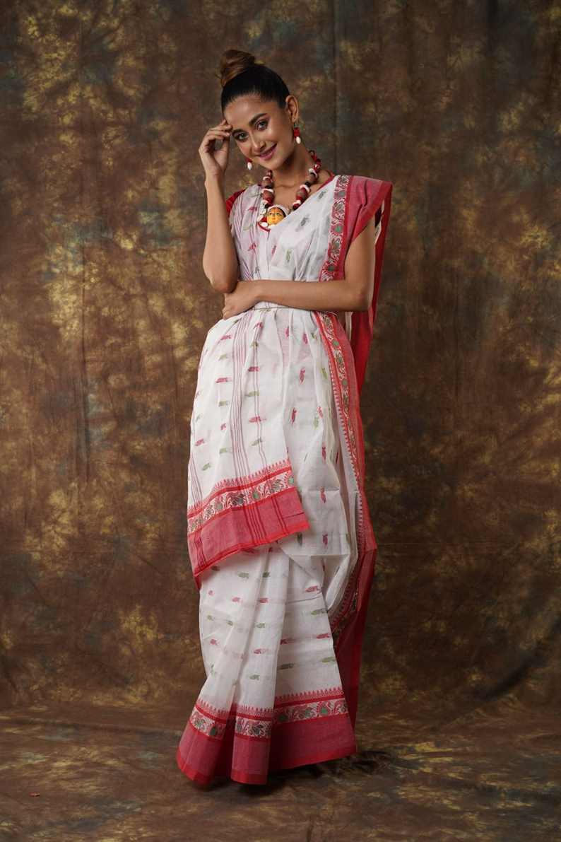 Traditional red & white colour combination Pure Cotton Bengali Handloom Tant Saree Without Blouse Piece 𝐒𝐢𝐳𝐞: Length: 5.5 Meters Width: 1.2 Meters Showcasing the Rich Cultural Heritage of Bengal.DN NO-1060