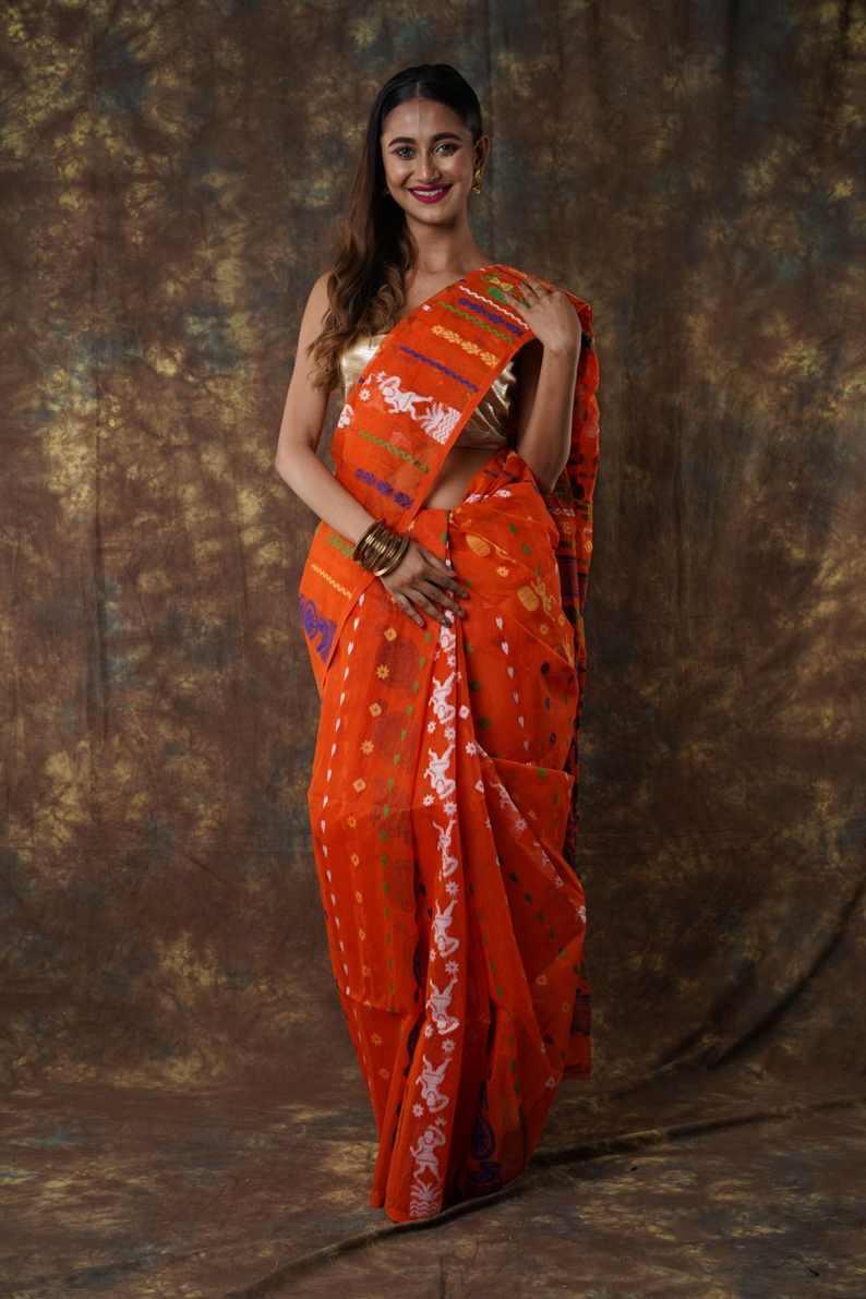 Traditional Bengal Cotton Silk Soft Jamdani Saree with orang colour combination ,Handwoven in the Rich Heritage of Bengal Minakari Dhakai | Item Length: 5.5 Metres Width: 1.2 Meters | Without Blouse Piece.DN NO-1059