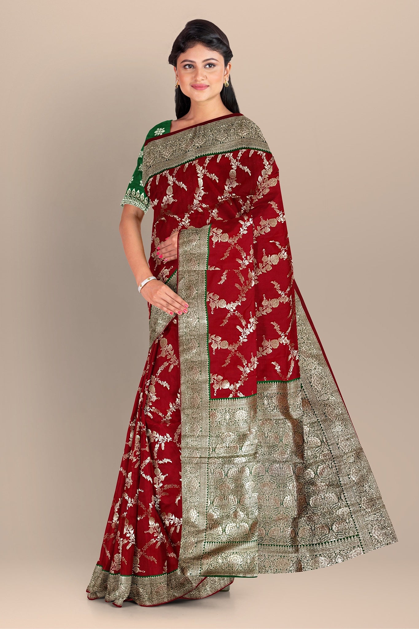Red and Green Silk Saree with Contrasting Kalka Designs and Buta Blouse