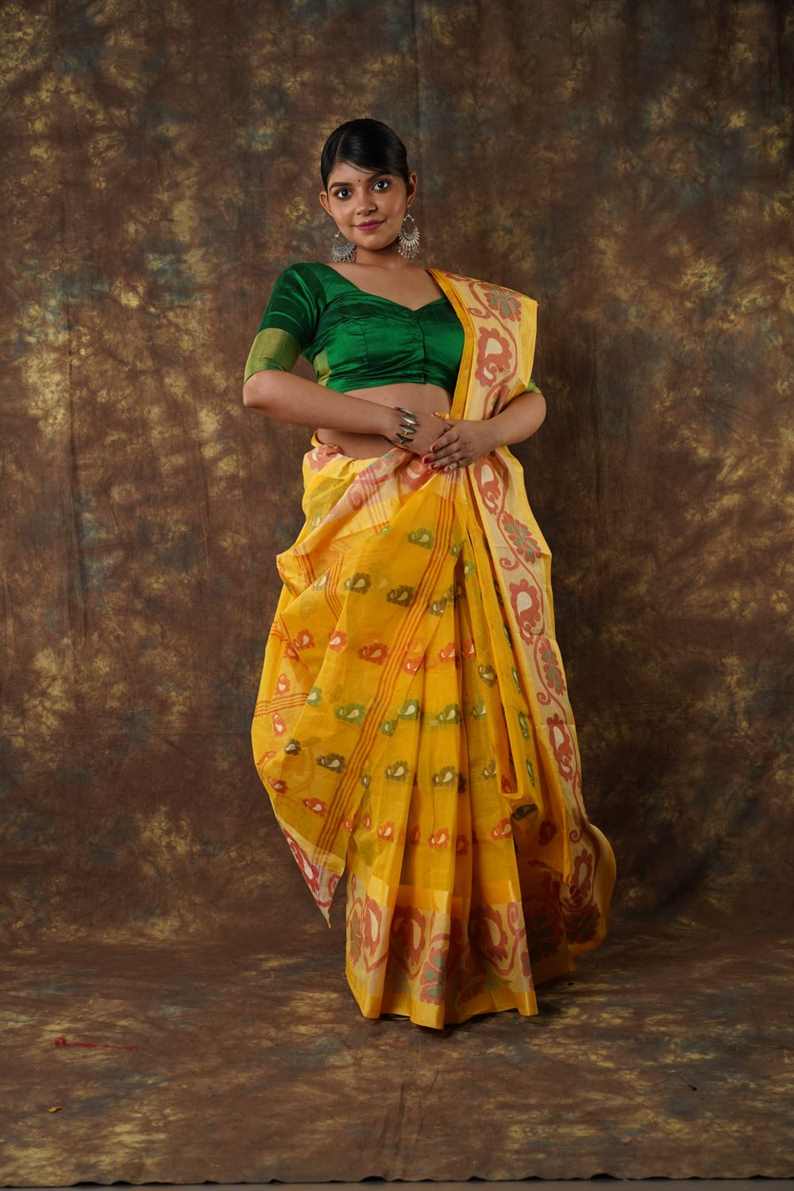 Traditional yellow colour combination Pure Cotton Bengali Handloom Tant Saree Without Blouse Piece 𝐒𝐢𝐳𝐞: Length: 5.5 Meters Width: 1.2 Meters Showcasing the Rich Cultural Heritage of Bengal