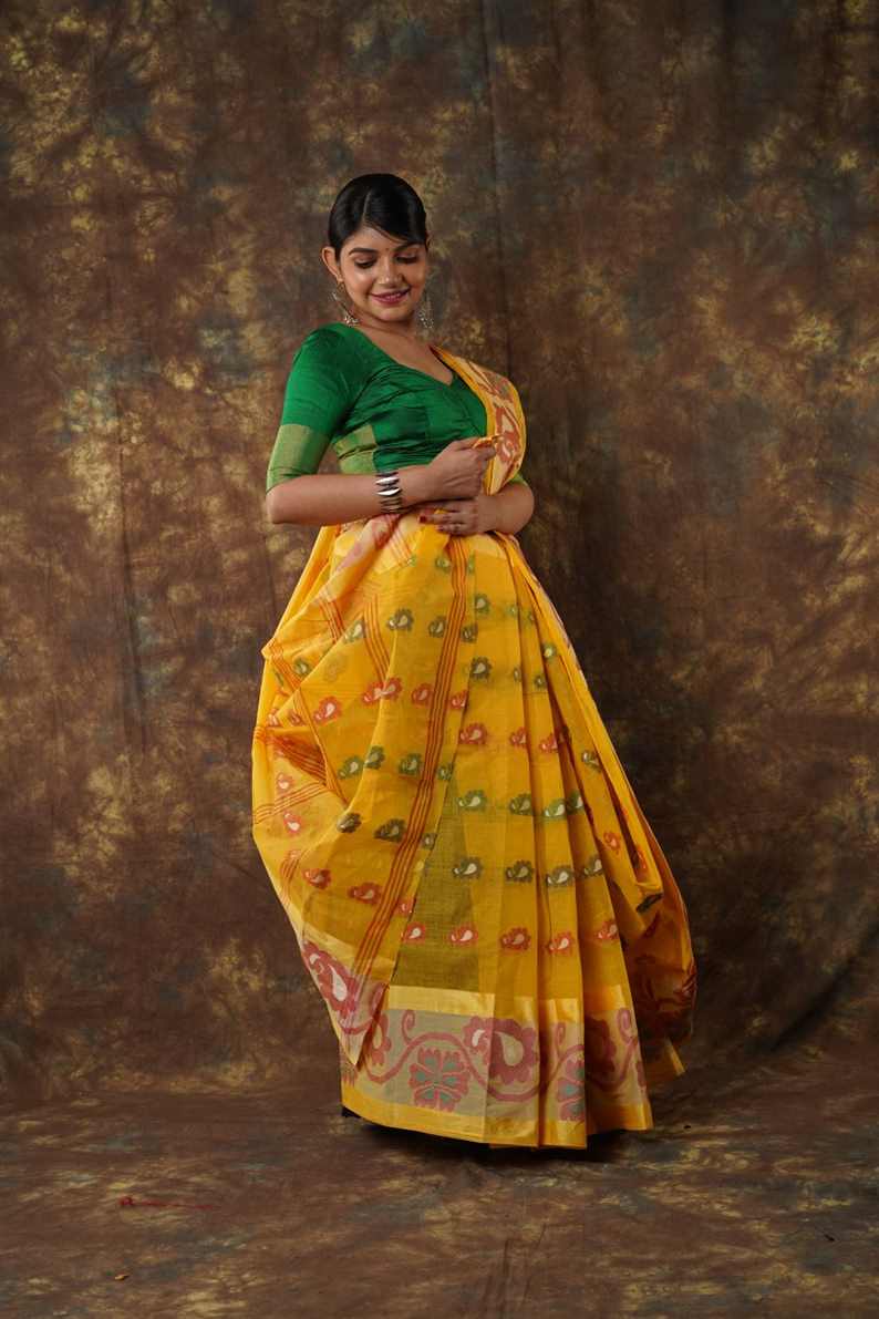 Traditional yellow colour combination Pure Cotton Bengali Handloom Tant Saree Without Blouse Piece 𝐒𝐢𝐳𝐞: Length: 5.5 Meters Width: 1.2 Meters Showcasing the Rich Cultural Heritage of Bengal