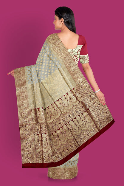 Title: Cream Colored Benarasi Saree with Maroon Contrast Pallu and Blouse Piece.DN NO-2010