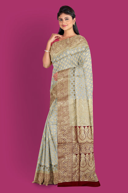 Title: Cream Colored Benarasi Saree with Maroon Contrast Pallu and Blouse Piece.DN NO-2010