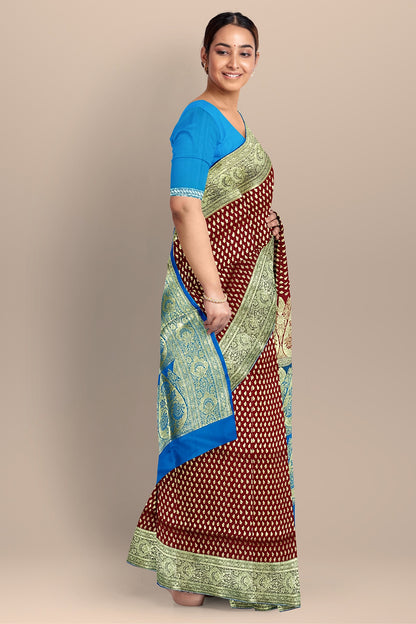 Fiery Red Benarasi Saree with Golden Buta and Firoza Contrast Pallu