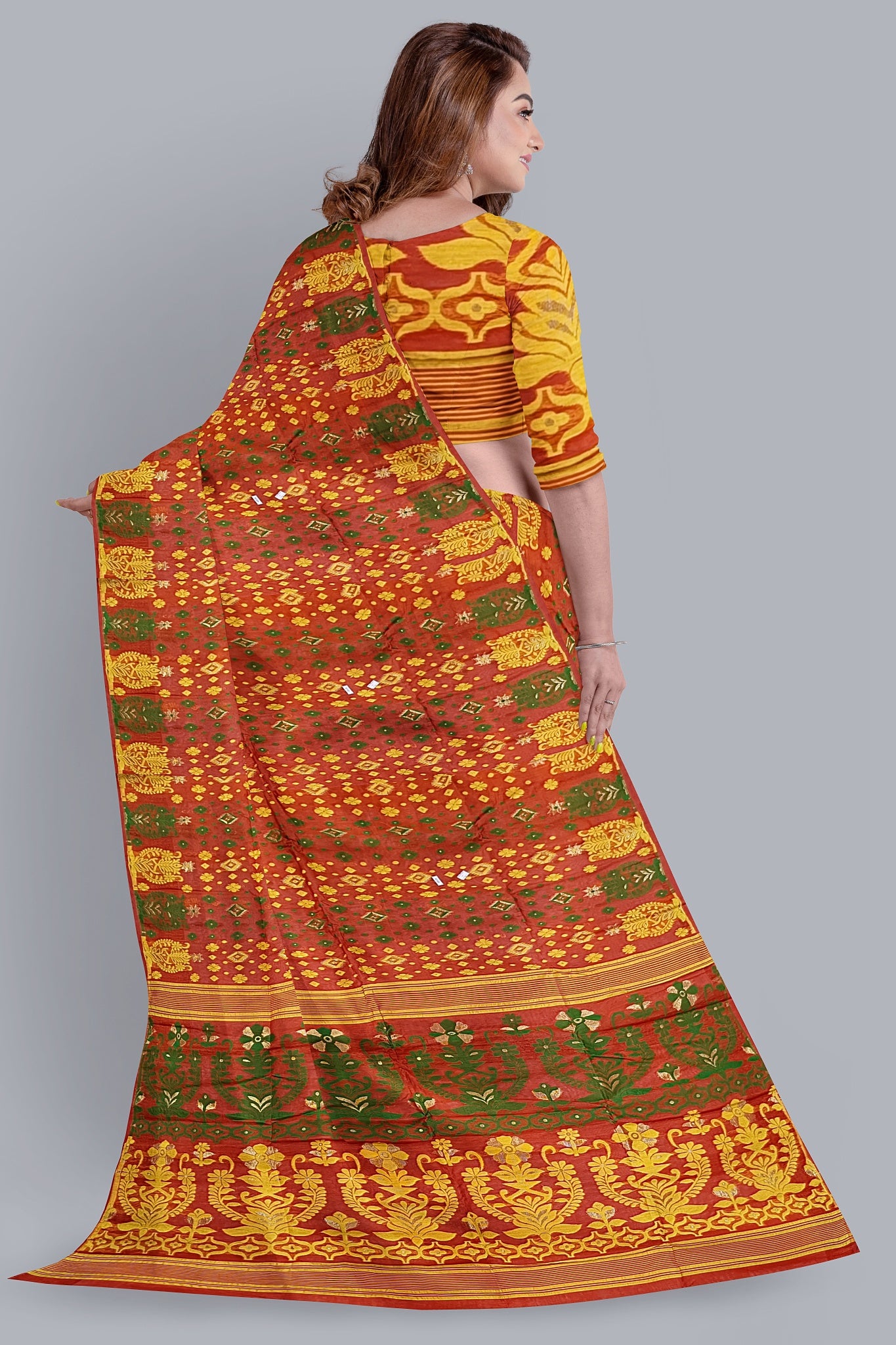 Vibrant Orange Dhakai Jamdani Saree with Green and Yellow Accents