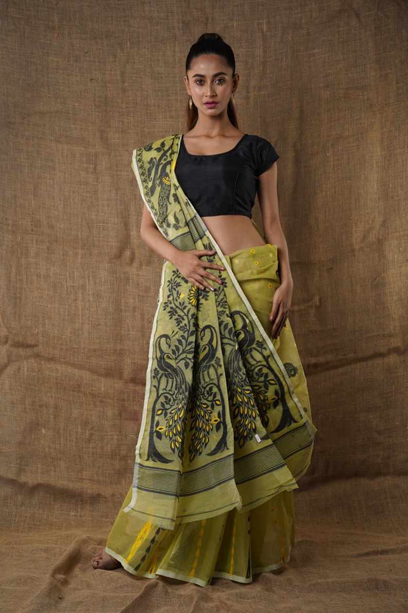 Traditional Bengal Cotton Silk Soft Jamdani Saree with Pesta green colour combination ,Handwoven in the Rich Heritage of Bengal Minakari Dhakai | Item Length: 5.5 Metres Width: 1.2 Meters | Without Blouse Piece.