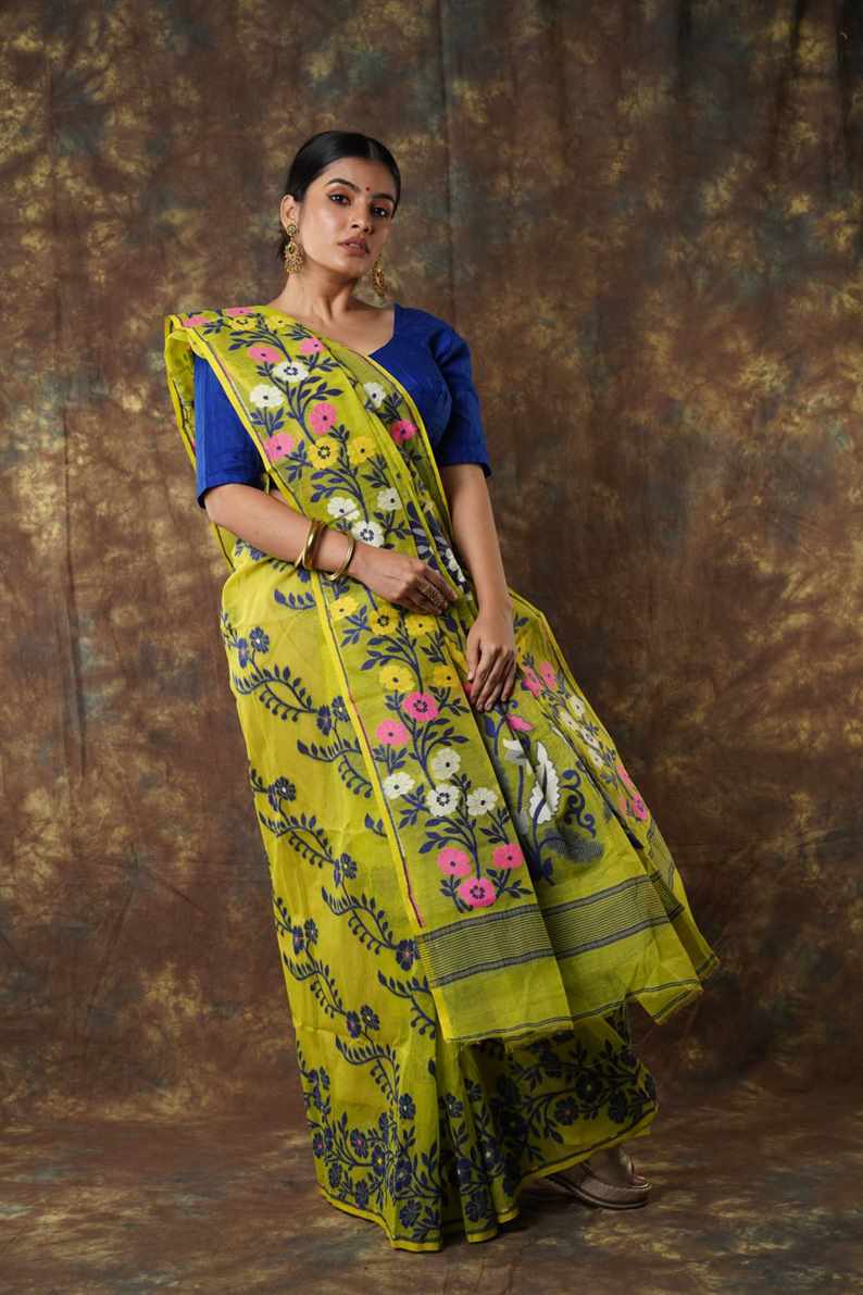 Traditional Bengal Cotton Silk Soft Jamdani Saree with parrot green colour   combination ,Handwoven in the Rich Heritage of Bengal Minakari Dhakai | Item Length: 5.5 Metres Width: 1.2 Meters | Without Blouse Piece.DN NO-1026