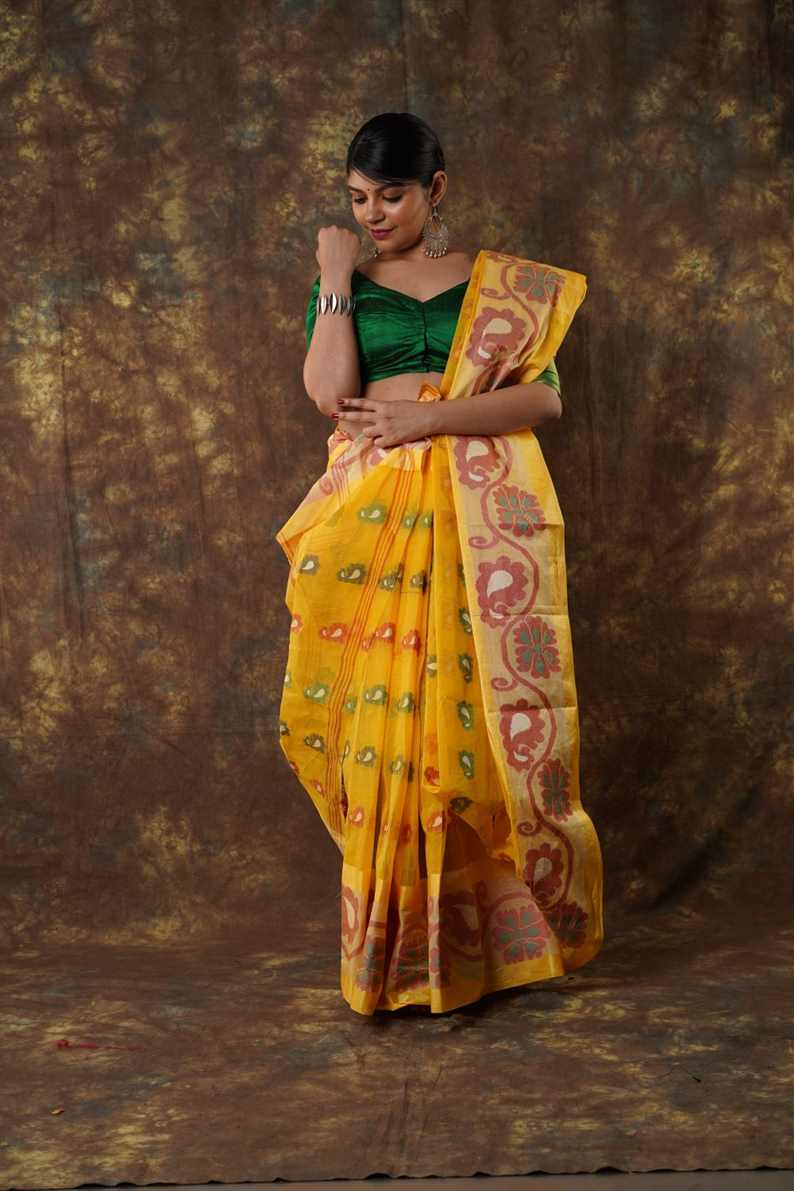 Traditional yellow colour combination Pure Cotton Bengali Handloom Tant Saree Without Blouse Piece 𝐒𝐢𝐳𝐞: Length: 5.5 Meters Width: 1.2 Meters Showcasing the Rich Cultural Heritage of Bengal