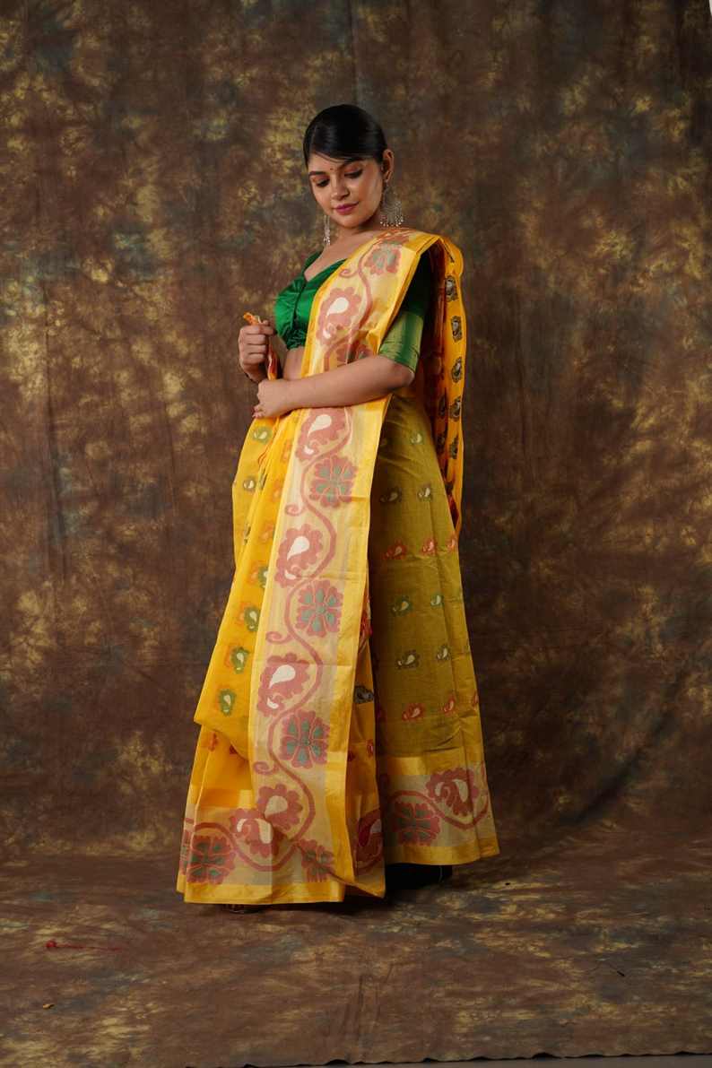 Traditional yellow colour combination Pure Cotton Bengali Handloom Tant Saree Without Blouse Piece 𝐒𝐢𝐳𝐞: Length: 5.5 Meters Width: 1.2 Meters Showcasing the Rich Cultural Heritage of Bengal