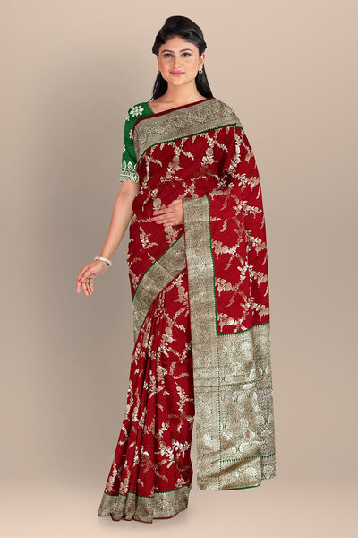 Red and Green Silk Saree with Contrasting Kalka Designs and Buta Blouse